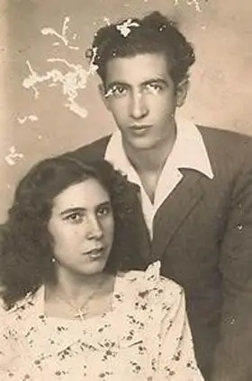Faded old wedding photo of vintage couple restored with professional AI photo restoration