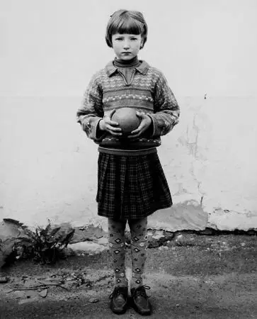 Young girl with ball vintage photo restoration example - Original