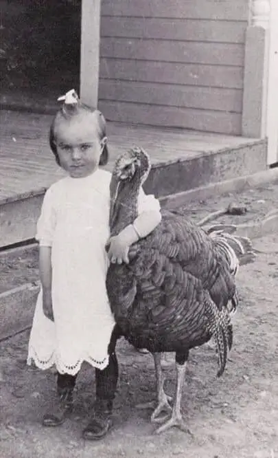 Girl with turkey historical photo restoration example - Original