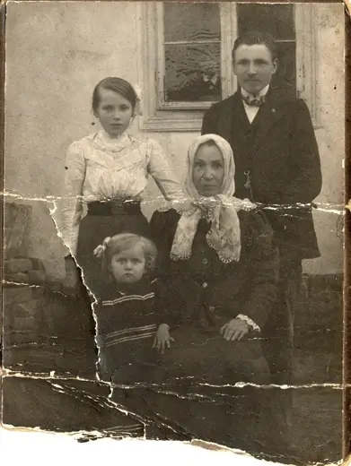 Scratched photo of vintage siblings restored to perfection using best AI photo scratch remover online
