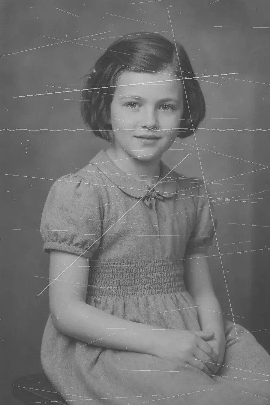 Scratched vintage schoolgirl portrait before scratch removal