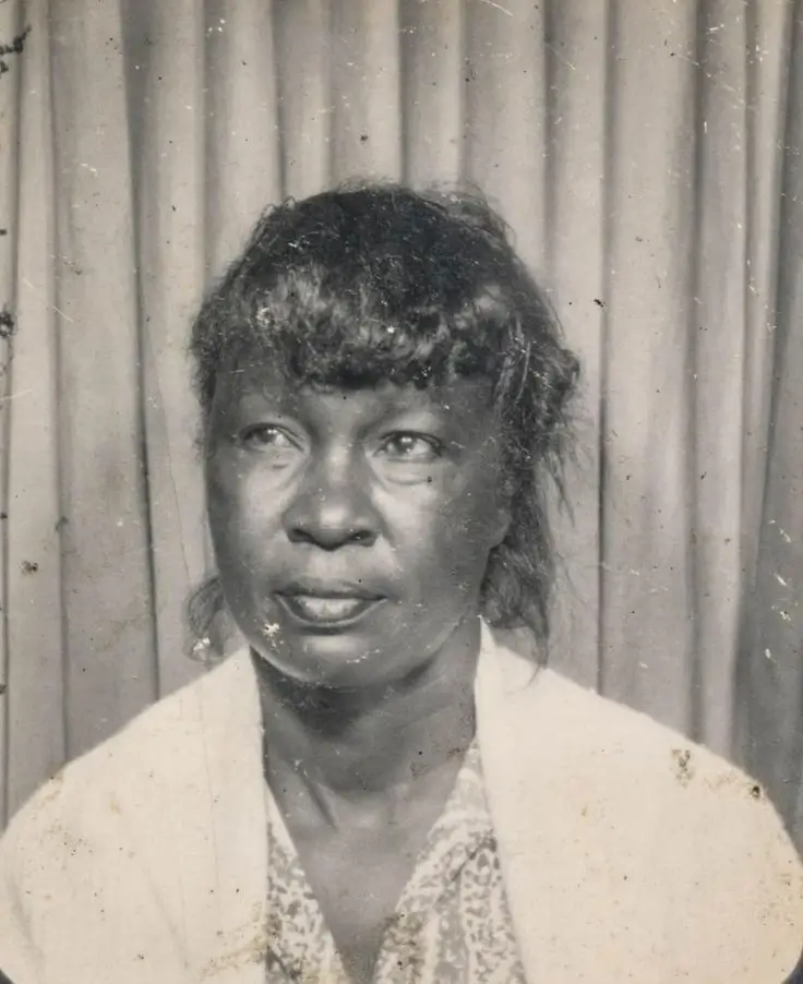 Historical black and white portrait of elderly woman colorized using advanced photo colorization service