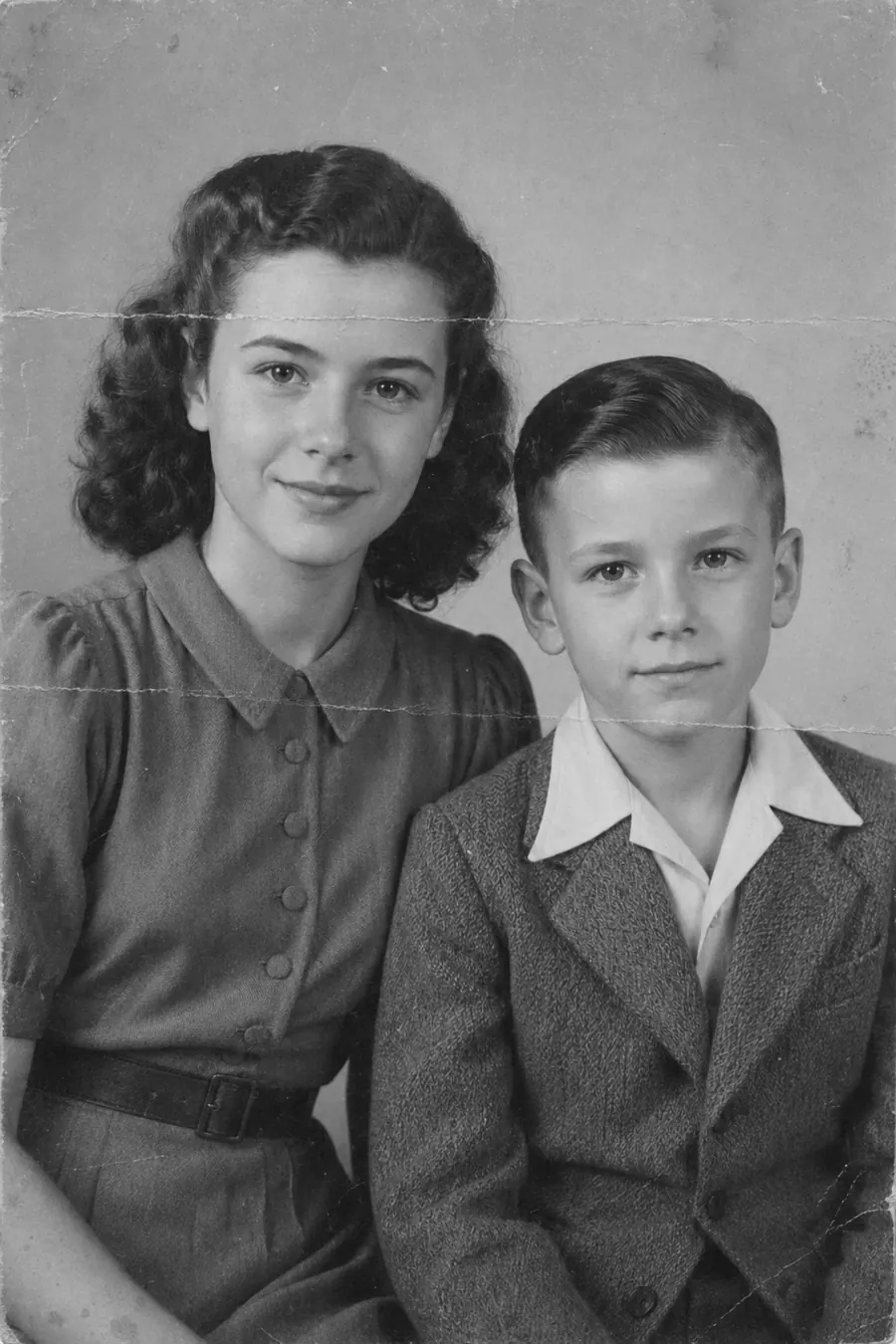 Damaged black and white family photo